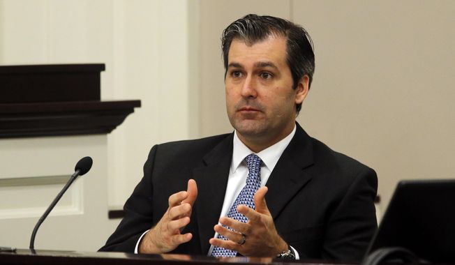 FILE - In this Nov. 29, 2016 file photo, former North Charleston police officer Michael Slager testifies during his murder trial at the Charleston County court in Charleston, S.C.  The U.S. Supreme Court has declined to hear the appeal of Slager, who was sentenced to 20 years in federal prison in the shooting death of an unarmed motorist who was running away from a traffic stop. In a notice issued Monday, June 3, 2019, the high court turned down the case from Slager.   (Grace Beahm/Post and Courier via AP, Pool, File)