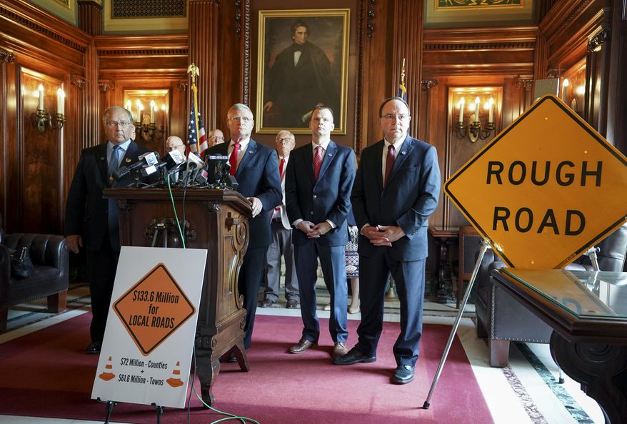 Republican state Senators, from left, Jerry Petrowski, R-Marathon, Howard Marklein, R-Spring Green,Devin LeMahieu, R-Oostburg, and Tom Tiffany, R-Minocqua, listen during a press conference at the State Capitol, Wednesday, June 5, 2019, in Madison Wis., to propose a plan to allocate $133.6 Million in a one-time General Purpose Revenue grants for local road construction project in the 2019-2021 State Budget. (Steve Apps/Wisconsin State Journal via AP)