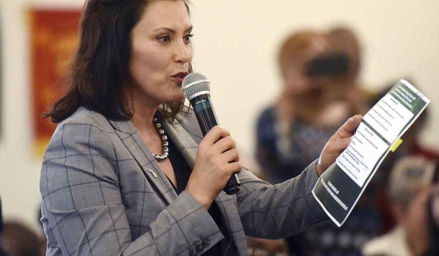 Gov. Gretchen Whitmer speaks during a town hall meeting, Wednesday, June 5, 2019, at Brotherhood of All Nations COGIC in Benton Harbor, Mich., to discuss the proposed closing of Benton Harbor High School. Because of school district debt and poor student performance, Whitmer's administration is proposing to close Benton Harbor High School in fall 2020 and send students elsewhere. (Don Campbell/The Herald-Palladium via AP)