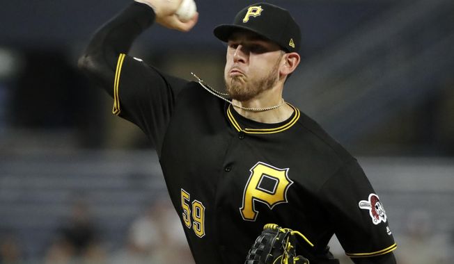 Pittsburgh Pirates starting pitcher Joe Musgrove delivers during the second inning of the team&#x27;s baseball game against the Atlanta Braves in Pittsburgh, Wednesday, June 5, 2019. (AP Photo/Gene J. Puskar)