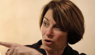 Democratic presidential candidate Sen. Amy Klobuchar, D-Minn., speaks to local residents during a meet and greet at a coffee shop, Saturday, May 25, 2019, in Iowa Falls, Iowa. (AP Photo/Charlie Neibergall)