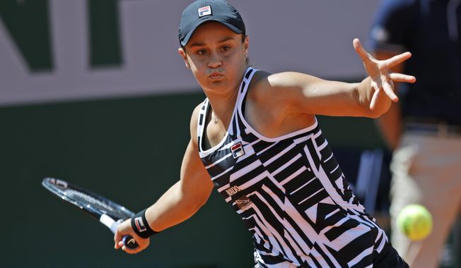Australia&#x27;s Asleigh Barty plays a shot against Madison Keys of the U.S. during their quarterfinal match of the French Open tennis tournament at the Roland Garros stadium in Paris, Thursday, June 6, 2019. (AP Photo/Pavel Golovkin)