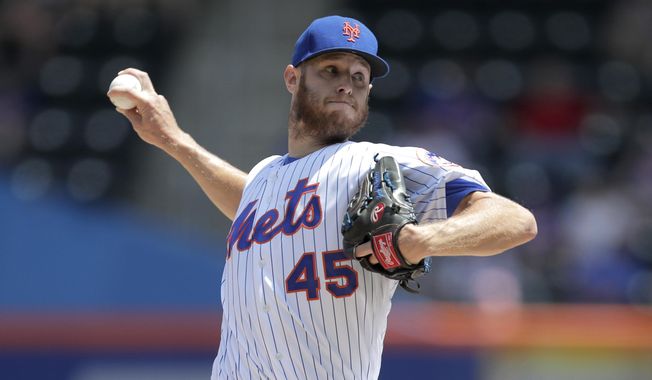 New York Mets starting pitcher Zack Wheeler throws a pitch to San Francisco Giants&#x27; Joe Panik during the first inning of a baseball game, Thursday, June 6, 2019, in New York. (AP Photo/Julio Cortez)
