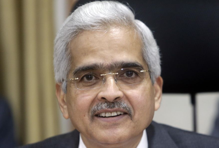 Reserve Bank of India Governor Shaktikanta Das addresses a press conference in Mumbai, India, Thursday, June 6, 2019. India's central bank has cut its key interest rate by a quarter of a percentage point to 5.75% from 6% with immediate effect to fortify the economy as consumer spending and corporate investment falter. (AP Photo/Rajanish Kakade)