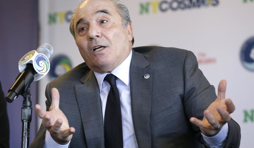 FILE - In this  Tuesday, March 21, 2017 file photo, Rocco Commisso, speaks to reporters during a news conference in the Brooklyn borough of New York. Italian-American businessman Rocco Commisso has completed his takeover of Serie A club Fiorentina. No financial details were disclosed but the deal is reportedly worth about 160 million euros. Commisso also owns the New York Cosmos of the North American Soccer League. (AP Photo/Seth Wenig, File )