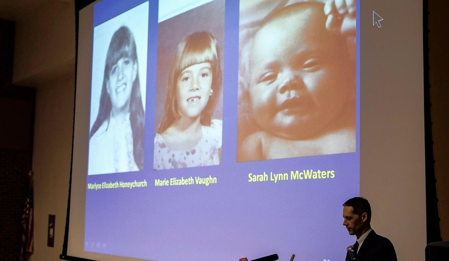 New Hampshire Senior Assistant Attorney General Jeffery Strelzin shows a slide of the three identified victims, Marlyse Honeychurch, left, and her daughters Marie Elizabeth Vaughn and Sarah Lynn McWaters at a press conference at the Department of Safety auditorium on Thursday, June 6, 2019 in Concord. (Michael Pezone/The Concord Monitor via AP)