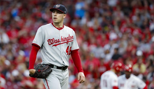 Washington Nationals starting pitcher Patrick Corbin walks to the dugout after being relieved in the fourth inning of a baseball game against the Cincinnati Reds, Friday, May 31, 2019, in Cincinnati. (AP Photo/John Minchillo) ** FILE **