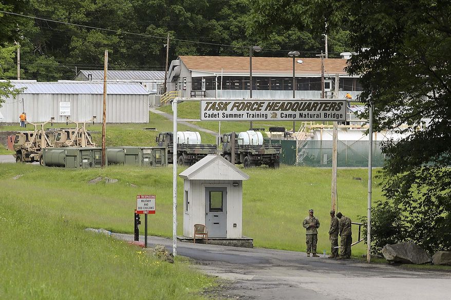 West Point cadets stand at the entrance to Camp Natural Bridge near the United States Military Academy at West Point, Thursday, June 6, 2019, in N.Y. (Seth Harrison/The Journal News via AP) ** FILE **