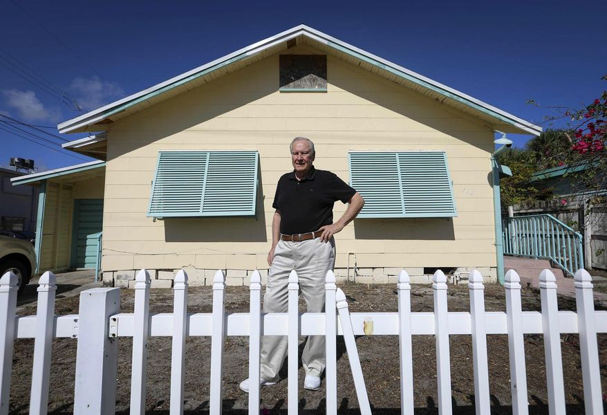 In this Nov. 18, 2018, photo, Curtis Rogers, co-founder of GEDmatch, stands outside his office in Lake Worth, Fla. The popular online genetics database used to find unknown relatives has tightened its policies for police usage over privacy concerns. (Bruce R. Bennett/The Palm Beach Post via AP)