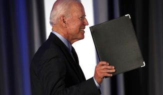 Democratic presidential candidate former Vice President Joe Biden gestures as he steps on stage before speaking during the I Will Vote Fundraising Gala Thursday, June 6, 2019, in Atlanta. (AP Photo/John Bazemore)