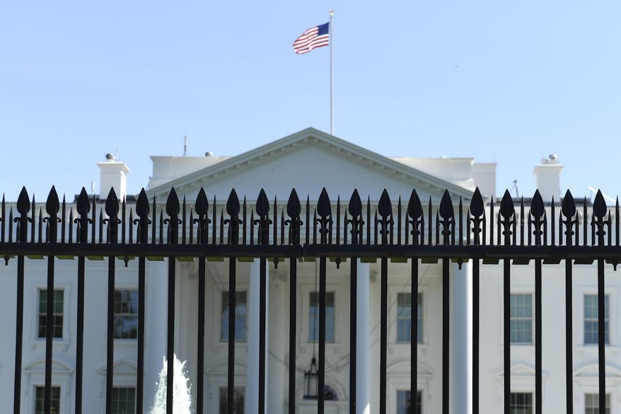 The fence surrounding the White House on Pennsylvania Avenue in Washington, Friday, May 24, 2019. Approval was given for a new and taller fence around the White House complex in 2017 and now construction of a almost 13-foot tall fence is slated to begin this summer. (AP Photo/Susan Walsh)