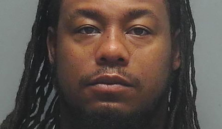 This photo provided by the Fort Myers Police Department shows Earl Antonio "Tony" Joiner. The former University of Florida football player has been arrested and charged with killing his wife in a case dating to 2016, police said. (Fort Myers Police Department via AP)
