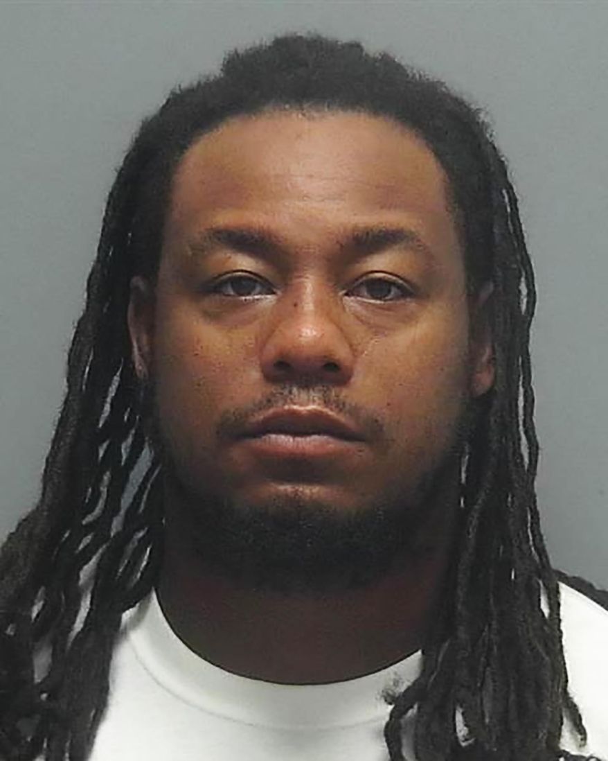 This photo provided by the Fort Myers Police Department shows Earl Antonio "Tony" Joiner. The former University of Florida football player has been arrested and charged with killing his wife in a case dating to 2016, police said. (Fort Myers Police Department via AP)