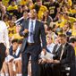 DeAndre Haynes (center) coaches the University of Michigan men&#39;s basketball team from the sidelines. Haynes joined the University of Maryland as an assistant coach on Monday, June 10, 2019. (Photo courtesy of Michigan athletics)