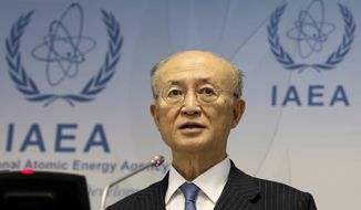 In this Thursday, Nov. 22, 2018, file photo, director General of the International Atomic Energy Agency, IAEA, Yukiya Amano of Japan, addresses the media during a news conference after a meeting of the IAEA board of governors at the International Center in Vienna, Austria. Yukiya Amano is urging world powers continue dialogue with Iran to keep it in the landmark 2015 deal aimed at preventing the country from building nuclear weapons.(AP Photo/Ronald Zak)