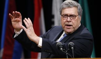 Attorney General William Barr, gestures as he speaks during a graduation ceremony for students of the Federal Bureau of Investigations National Academy at the FBI training facility in Quantico, Va., Friday, June 7, 2019. (AP Photo/Steve Helber) **FILE**