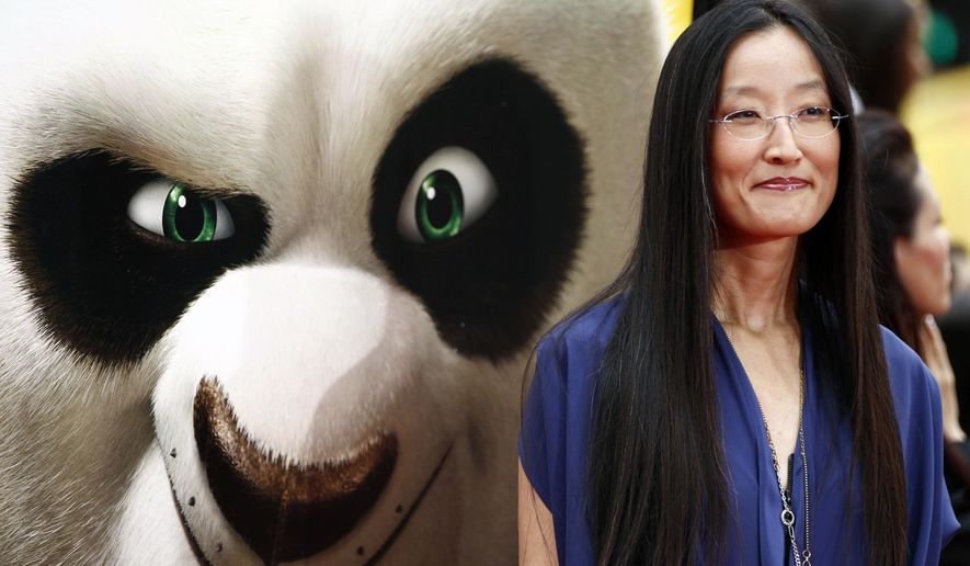 FILE - In this Sunday, May 22, 2011, file photo, director Jennifer Yuh Nelson arrives at the premiere of "Kung Fu Panda 2," in Los Angeles. Women make up roughly half of all executives in animation, but the numbers fall significantly when it comes to female directors, according to a study from USC Annenberg Inclusion Initiative and the non-profit advocacy group Women in Animation. The study released Monday, June 10, 2019, says that in the past 12 years only 3% of animated film directors were women and only one was a woman of color. (AP Photo/Matt Sayles, File)