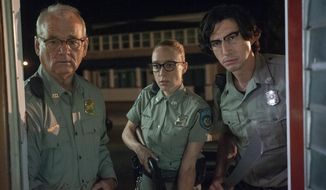 This undated image provided by Focus Features from left to right, shows Bill Murray, Chloë Sevigny and Adam Driver in a scene from writer/director Jim Jarmusch&#39;s &amp;quot;The Dead Don’t Die.&amp;quot; (Abbot Genser/Image Eleven Productions, Inc./Focus Features via AP)