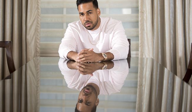 In this Monday, June 10, 2019 photo, singer Romeo Santos poses for a portrait at the JW Marriott Essex House in New York, New York. (Photo by Brian Ach/Invision/AP)