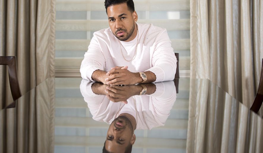 In this Monday, June 10, 2019 photo, singer Romeo Santos poses for a portrait at the JW Marriott Essex House in New York, New York. (Photo by Brian Ach/Invision/AP)
