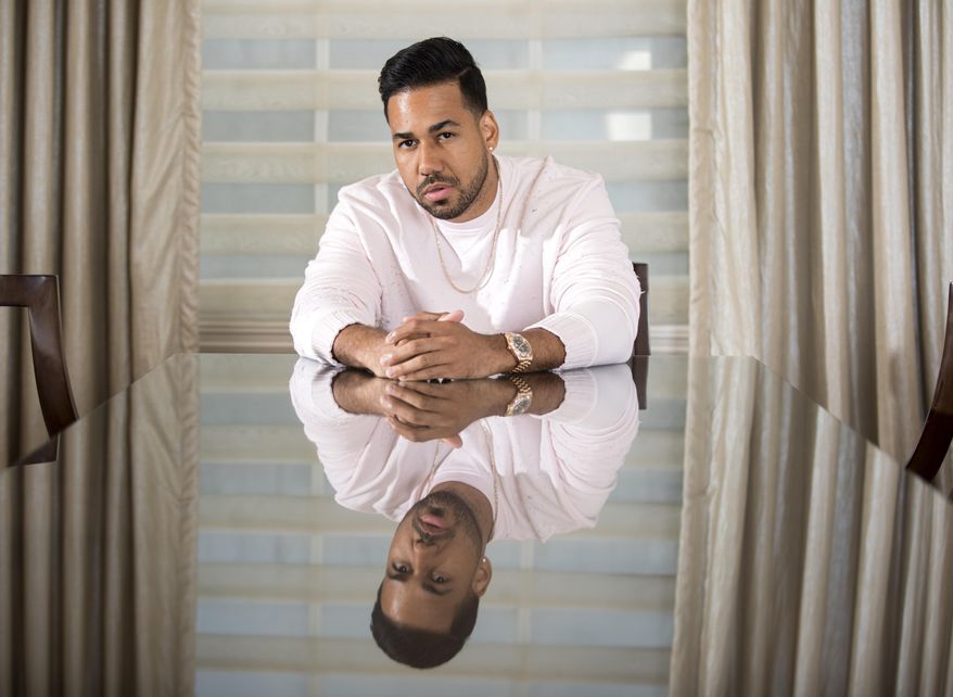 In this Monday, June 10, 2019 photo, singer Romeo Santos poses for a portrait at the JW Marriott Essex House in New York, New York. (Photo by Brian Ach/Invision/AP)