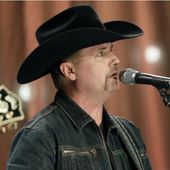 In a Dec. 13, 2016, file photo, John Rich of the country music duo Big &amp; Rich performs a song during a taping for Dolly Parton&#x27;s Smoky Mountain Rise Telethon in Nashville, Tenn. (AP Photo/Mark Humphrey, File)