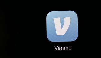 This March 20, 2018, file photo shows the Venmo app on an iPad in Baltimore. (AP Photo/Patrick Semansky, File)