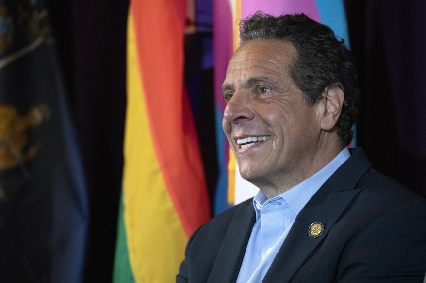 New York Gov. Andrew Cuomo speaks at the Lesbian, Gay, Bisexual & Transgender Community Center, Monday, June 10, 2019 in New York. The governor is pushing to legalize gestational surrogacy and ban the gay and trans panic defense. (AP Photo/Mark Lennihan)