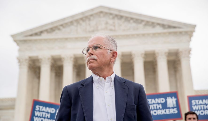Public employees in New Jersey say a new law forcing them to pay union dues if they don&#x27;t quickly withdraw from the union contradicts the Supreme Court ruling in favor of plaintiff Mark Janus. (Associated Press)
