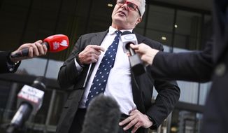 David William McBride speaks to the media after appearing in the Australian Capital Territory Supreme Court in Canberra, Thursday, June 13, 2019. The former Australian army lawyer charged with leaking secret documents to journalists says his prosecution is not about protecting national security but concealing &amp;quot;a national shame.&amp;quot; (Lukas Coch/AAP Image via AP)