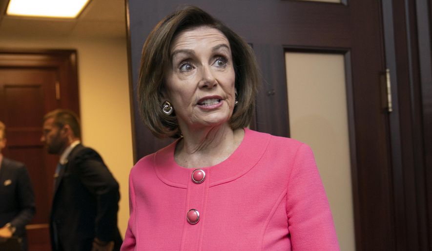 Speaker of the House Nancy Pelosi, D-Calif., arrives for a closed-door meeting with her Democratic Caucus prior to a vote that would would authorize lawsuits against Attorney General William Barr and former White House counsel Don McGahn for defying subpoenas pertaining to special counsel Robert Mueller's report, at the Capitol in Washington, Tuesday, June 11, 2019. Barr and McGahn defied the subpoenas on orders from President Donald Trump. (AP Photo/J. Scott Applewhite)
