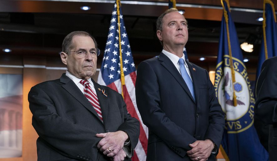 House Judiciary Committee Chairman Jerrold Nadler, D-N.Y., left, and House Intelligence Committee Chairman Adam B. Schiff, D-Calif., pause before taking questions from reporters after passage of a resolution to take legal action against President Donald Trump&#39;s administration and potential witnesses, a response to those who defy subpoenas in Congress&#39; Russia probe and other investigations, on Capitol Hill in Washington, Tuesday, June 11, 2019.  (AP Photo/J. Scott Applewhite)