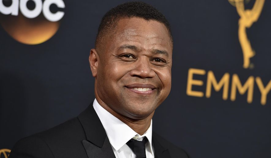 FILE- In this Sept. 18, 2016 file photo, Cuba Gooding Jr. arrives at the 68th Primetime Emmy Awards in Los Angeles. Gooding is expected to turn himself in to the New York Police Department on Thursday, June 13, 2019, after being accused of groping a woman at a midtown Manhattan nightclub Sunday, June 9. (Photo by Jordan Strauss/Invision/AP, File)