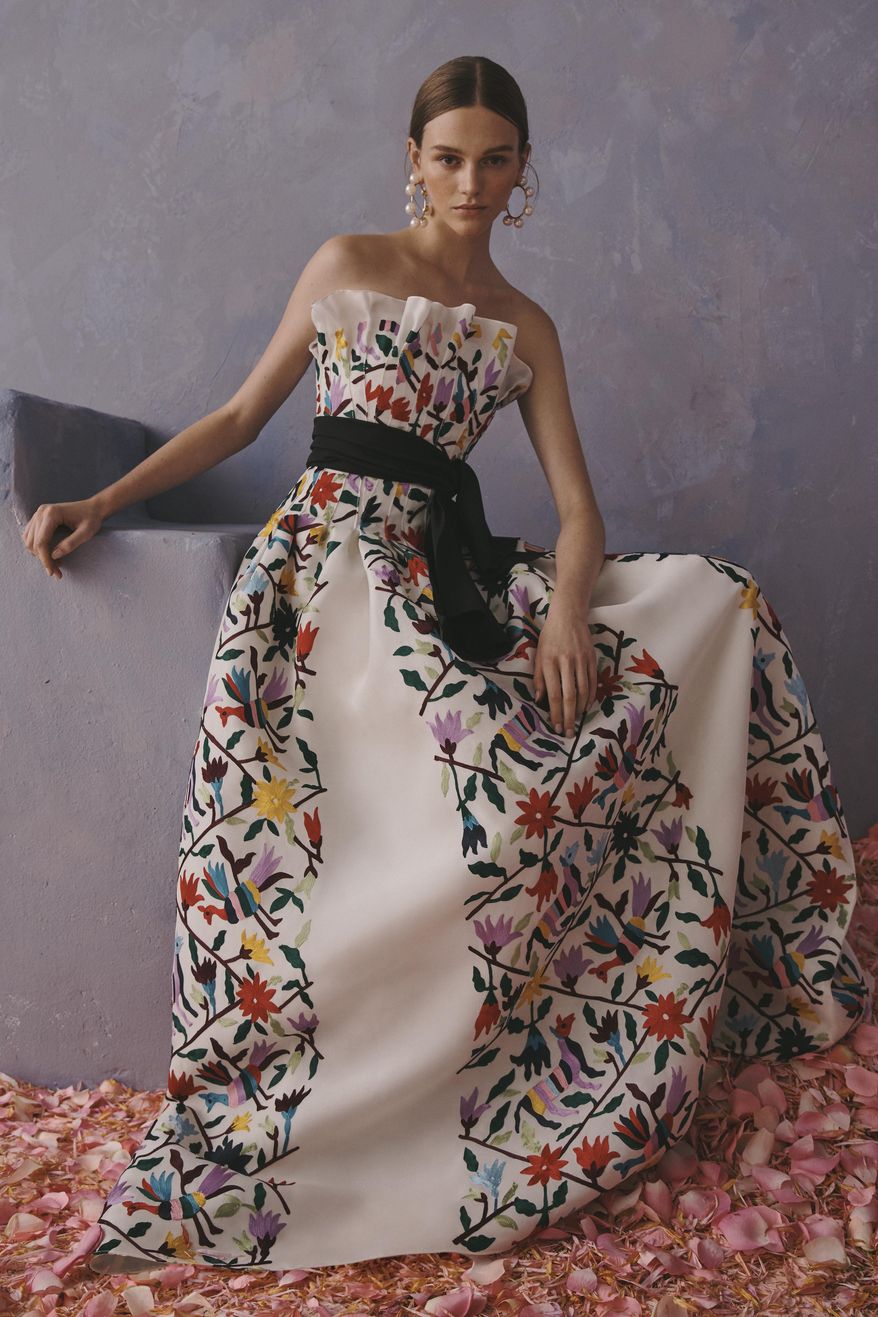 This photo provided by Griffin Marketing and Public Relations and Carolina Herrera shows a model posing for the Carolina Herrera Resort Collection 2020. The Mexican government accused this week the fashion house Carolina Herrera of cultural appropriation because it incorporated Mexican indigenous elements and embroidery in one of its collections. The fashion house responded Wednesday that it only wanted to pay tribute to the richness of Mexican culture.( Carolina Herrera via AP)