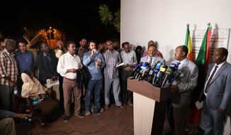 Special envoy of the Ethiopian Prime Minister Ambassador Mahmoud Dreir speaks to the press at the Ethiopian embassy, Khartoum, Sudan Tuesday, June 11, 2019 on the agreement to end the civil disobedience of the country between the forces of freedom and change and the military council. (AP Photo)