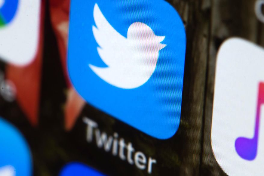 FILE - This Wednesday, April 26, 2017, file photo shows the Twitter app on a mobile phone in Philadelphia. Twitter said Thursday, June 13, 2019, it has deleted nearly 4,800 accounts linked to the Iranian government which served to promote state actions without disclosing their political connection. (AP Photo/Matt Rourke, File)