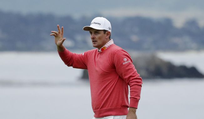 Justin Rose, of England, waves after his first round of the U.S. Open Championship golf tournament Thursday, June 13, 2019, in Pebble Beach, Calif. (AP Photo/Matt York)