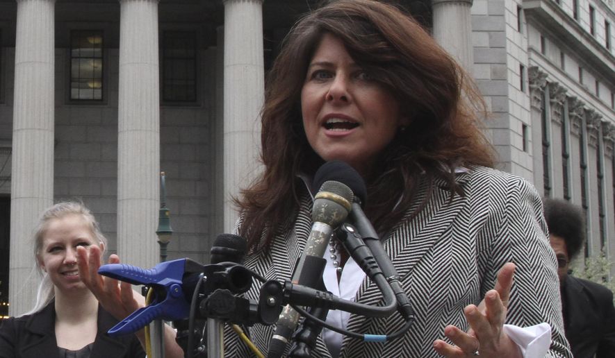 In this March 29, 2012, file photo author and political consultant Naomi Wolf speaks to reporters during a news conference in New York. (AP Photo/Mary Altaffer) ** FILE **