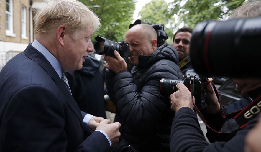 British Conservative Party lawmaker Boris Johnson leaves his home in London, Thursday, June 13, 2019. Britain's Conservative Party is holding an election to replace Prime Minister Theresa May, who resigned last week after failing to lead Britain out of the European Union on schedule. Former Foreign Minister Boris Johnson is currently the bookies favorite to replace May. (AP Photo/Frank Augstein)