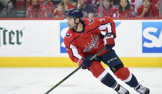  In this April 26, 2018, file photo, Washington Capitals defenseman Matt Niskanen (2) skates with the puck during the first period in Game 1 of an NHL second-round hockey playoff series against the Pittsburgh Penguins,in Washington. The Philadelphia Flyers have acquired defenseman Matt Niskanen from the Washington Capitals for defenseman Radko Gudas. This is the first significant move of the NHL offseason after the St. Louis Blues won the Stanley Cup less than 36 hours prior. (AP Photo/Nick Wass, File) **FILE**