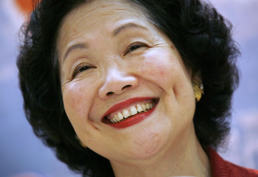 FILE - This July 6, 2008, file photo shows Hong Kong's former Chief Secretary Anson Chan during a press conference in Hong Kong. Chan, long an outspoken advocate for more democracy in the ex-British colony, is urging the city's chief executive, Carrie Lam, to shelve proposed extradition legislation that has sparked mass protests. On Thursday, June 13, 2019, dozens of people were injured in clashes with police. In an interview with The Associated Press, the 79-year-old Chan said a massive protest march Sunday, June 9, that drew hundreds of thousands of people showed "the Hong Kong spirit at its best."(AP Photo/Vincent Yu, File)