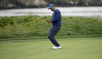 Tiger Woods reacts after missing a putt on the 17th hole during the second round of the U.S. Open golf tournament Friday, June 14, 2019, in Pebble Beach, Calif. (AP Photo/Marcio Jose Sanchez)