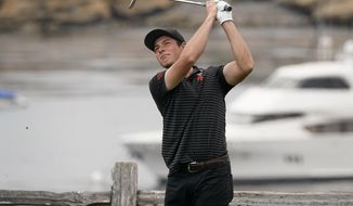 Amateur player, Viktor Hovland, of Norway, watches his tee shot on the seventh hole during the first round of the U.S. Open Championship golf tournament Thursday, June 13, 2019, in Pebble Beach, Calif. (AP Photo/David J. Phillip)