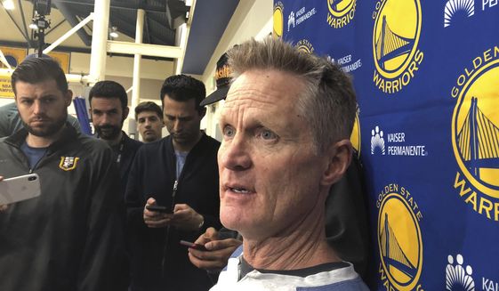 Golden State Warriors coach Steve Kerr talks with reporters at the NBA basketball team&#x27;s practice facility Friday, June 14, 2019, in Oakland, Calif. Their three-peat quest denied by the champion Raptors, the Warriors now brace for major uncertainty ahead as Kevin Durant begins a long rehab from right Achilles tendon surgery and must decide where to sign and Klay Thompson has a torn left ACL that will be another lengthy recovery. (AP Photo/Janie McCauley)