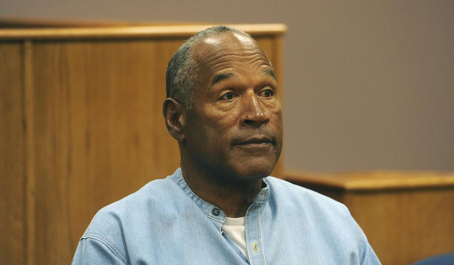 In this July 20, 2017, file photo, former NFL football star O.J. Simpson appears via video for his parole hearing at the Lovelock Correctional Center in Lovelock, Nev.  Simpson has launched a Twitter account with a video post in which the former football star says he’s got a “little gettin’ even to do.” Simpson confirmed the new account to The Associated Press on Saturday, June 15, 2019. Simpson said in a phone interview it will be a lot of fun and that he had some things to straighten out. (Jason Bean/The Reno Gazette-Journal via AP, Pool, File) ** FILE **