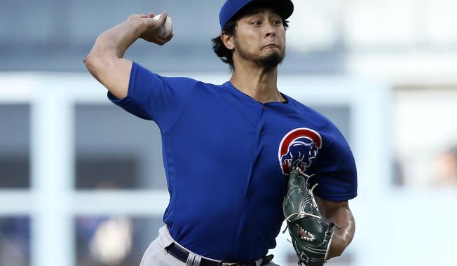 Chicago Cubs starting pitcher Yu Darvish throws to a Los Angeles Dodgers batter during the first inning of a baseball game in Los Angeles, Saturday, June 15, 2019. (AP Photo/Alex Gallardo)
