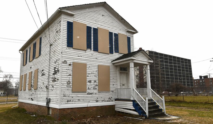 The former home of Ulysses S. Grant when he was stationed in Detroit as a lieutenant in the mid-1800s sits at the former Michigan State Fairgrounds in Detroit in this 2018 photo, vacant and boarded up for years. Later in 2019 it will move to the Eastern Market area, where it will become a public education and resource center.  (Daniel MearsDetroit News via AP)