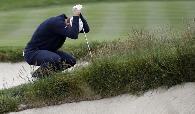 Justin Rose, of England, reacts to his bunker shot on the second hole during the final round of the U.S. Open Championship golf tournament Sunday, June 16, 2019, in Pebble Beach, Calif. (AP Photo/Marcio Jose Sanchez)
