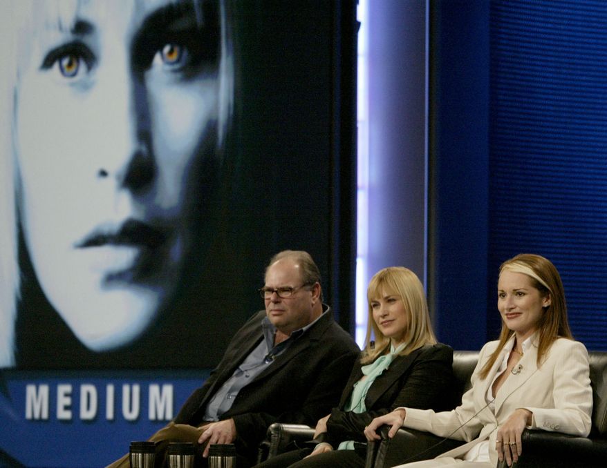 wNBC's "Medium" Executive producer, Glen Gordon Caron, left, actress Patricia Arquette, center and Allison Dubois speak to the media Friday Jan. 21, 2005 at the Television Critics Association winter meeting in Los Angeles. It's been a tough year for NBC, which is in third place behind CBS and resurgent ABC among viewers aged 18 to 49. "Medium" is one of the network shows that have shown signs of modest success. (AP Photo/Nick Ut) **FILE**