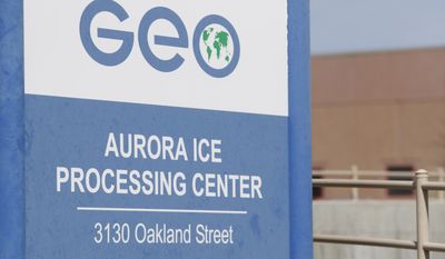 This Saturday, April 15, 2017, photograph shows the entrance to the GEO Group&#39;s immigrant detention facility in Aurora, Colo. People once held in a privately run Colorado immigration detention center are challenging the system used to keep it clean and maintained, arguing it borders on slavery. They have won the right to sue GEO Group on behalf of an estimated 60,000 people held at its detention center near Denver over a decade. (AP Photo/David Zalubowski)